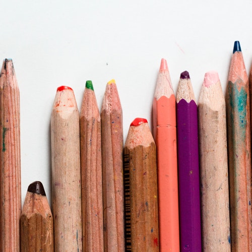 Coloured pencils of different lengths and sharpness.