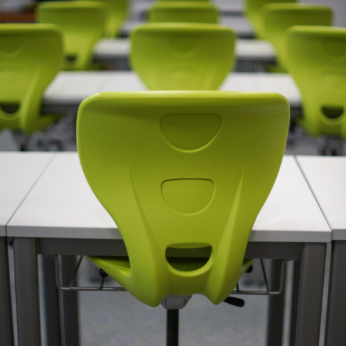 empty chairs in classroom